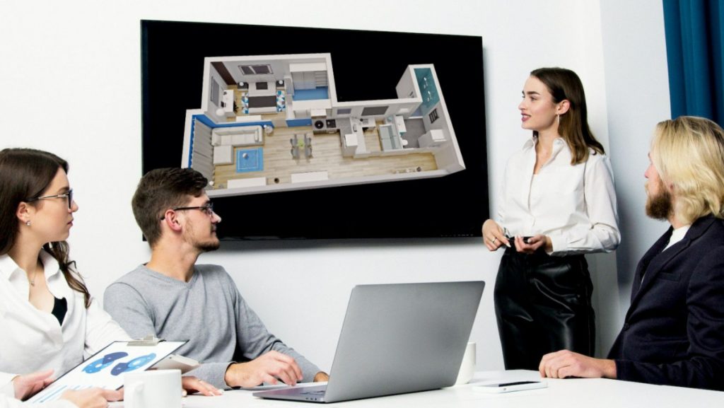 Imagen de un equipo de profesionales trabajando en una infografía 3D del plano de planta de una vivienda. Esta representación visual permite a los clientes experimentar una vista previa inmersiva de cómo se vería su propiedad después de aplicar técnicas de Home Staging. Desde citas telemáticas hasta cuestionarios personalizados, nuestro proceso garantiza la satisfacción del cliente al ofrecer representaciones precisas y adaptadas a sus preferencias. J. Capmany Profesional 3D. Infografías 3D para interiorismo, arquitectura e inmobiliarias.