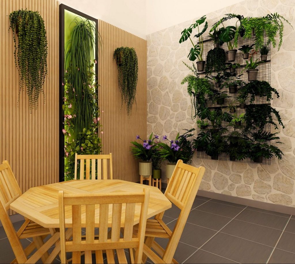 Infografía 3D de J Capmany que representa un patio pequeño con un jardín vertical de plantas naturales, mostrando cómo aprovechar espacios reducidos de manera sostenible y atractiva