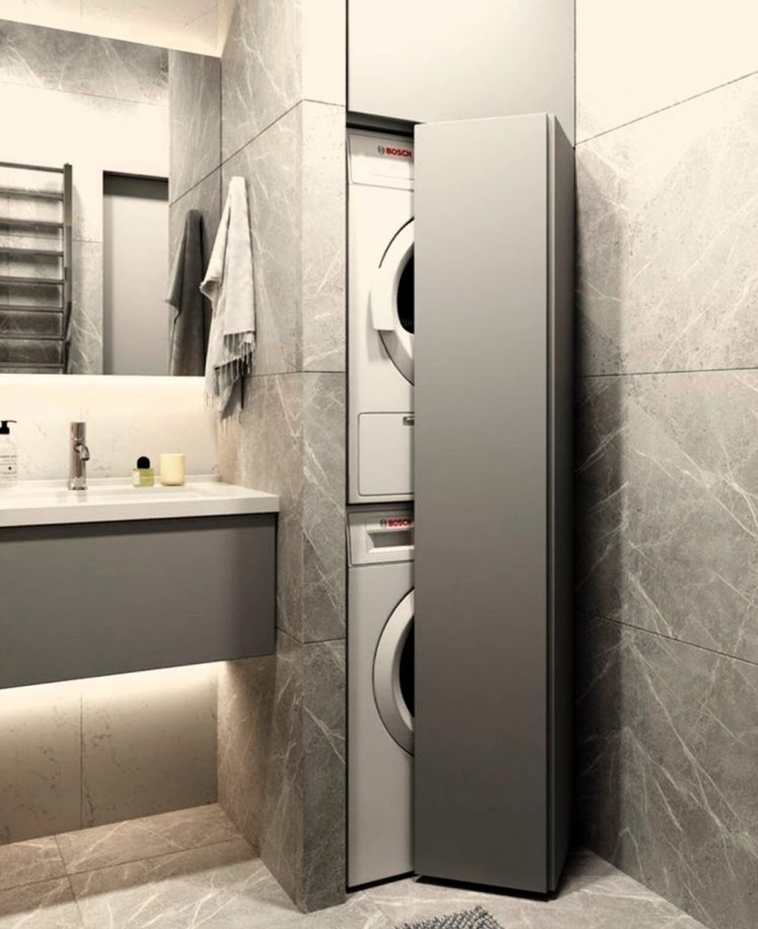 Baño elegante con puerta plegable que seca lavadora y secadora, integrado en el diseño