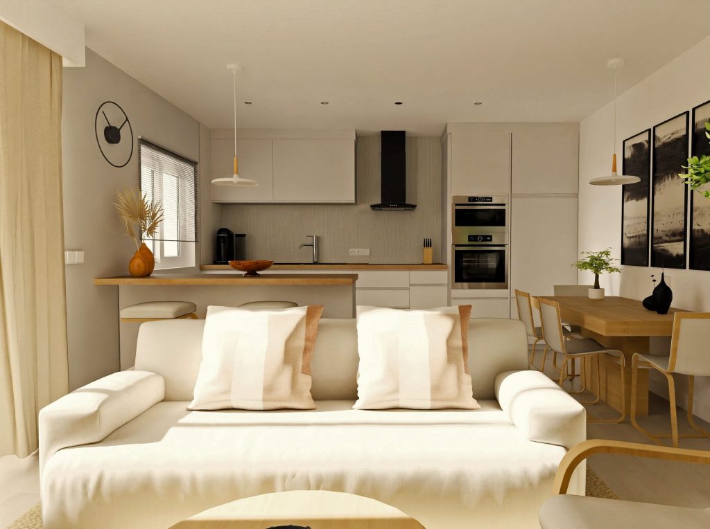 Render 3D de un espacio abierto moderno con cocina, salón y comedor, donde se aprecian textiles en tonos neutros, plantas naturales y elementos decorativos en color negro como cuadros y reloj de pared